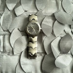 Gently used Kenneth Cole Watch. Needs battery
